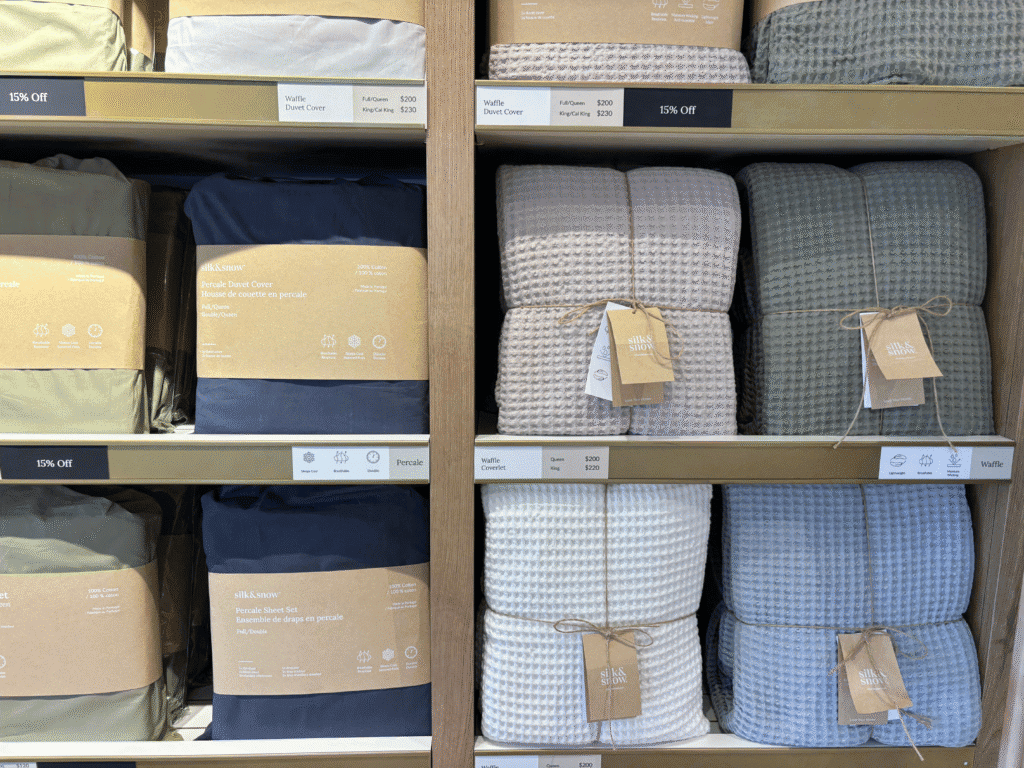 Soft pastel-colored waffle-patterned bedding and duvet covers on display at Slumber.ca.